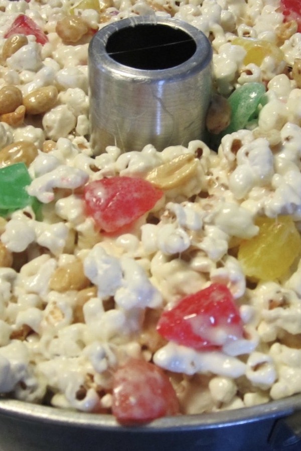 popcorn cake with gumdrops and peanuts