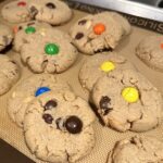 soft gluten-free peanut butter cookies with pieces of candy